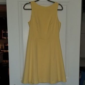 Soft yellow sleeveless A-line dress